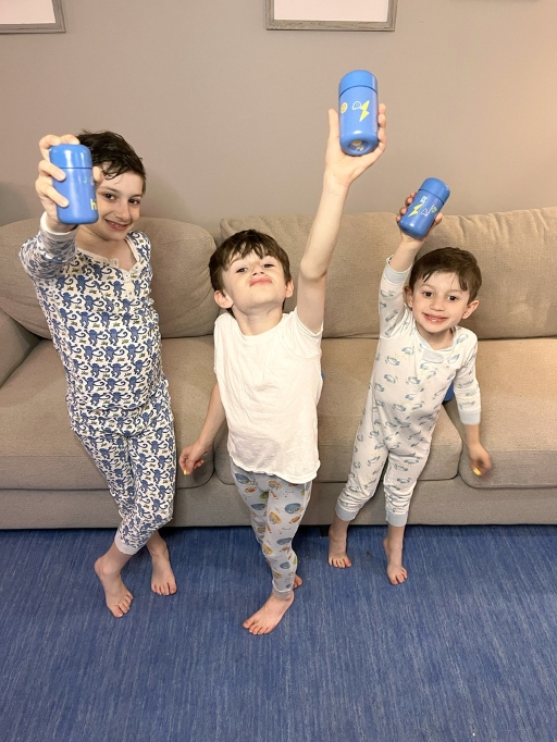 kids holding up hiya nightly bedtime essentials